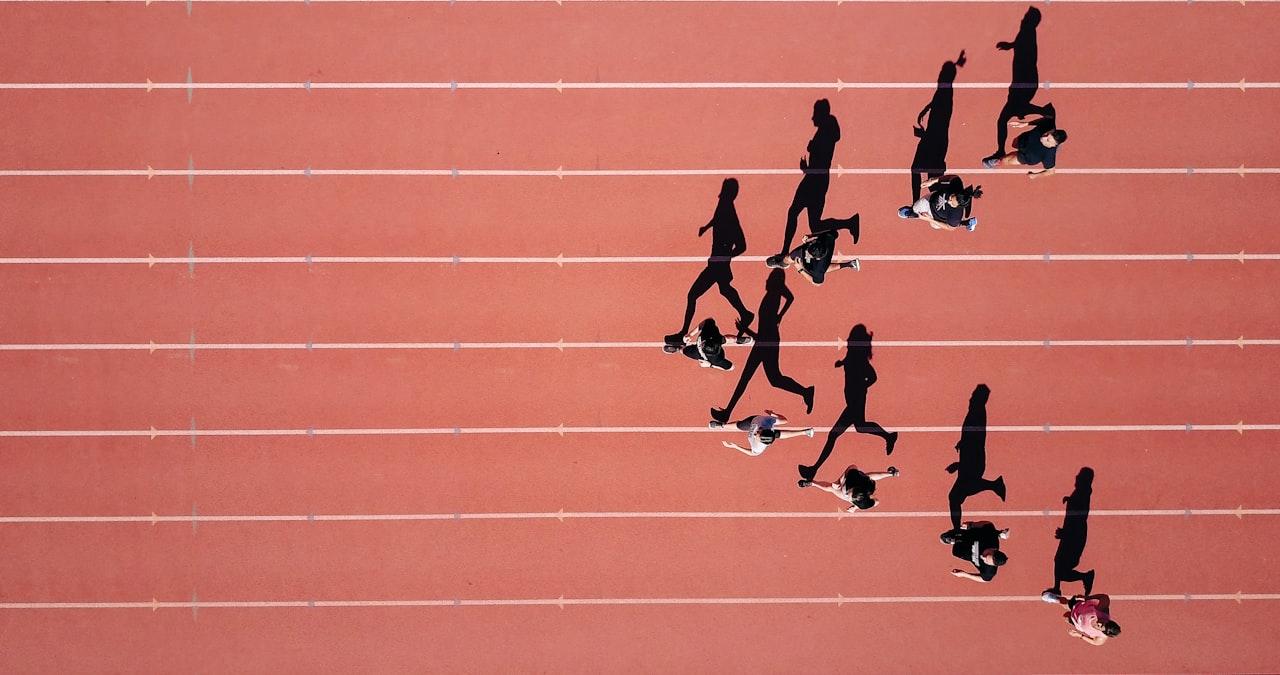 Athletes running on the track during competition